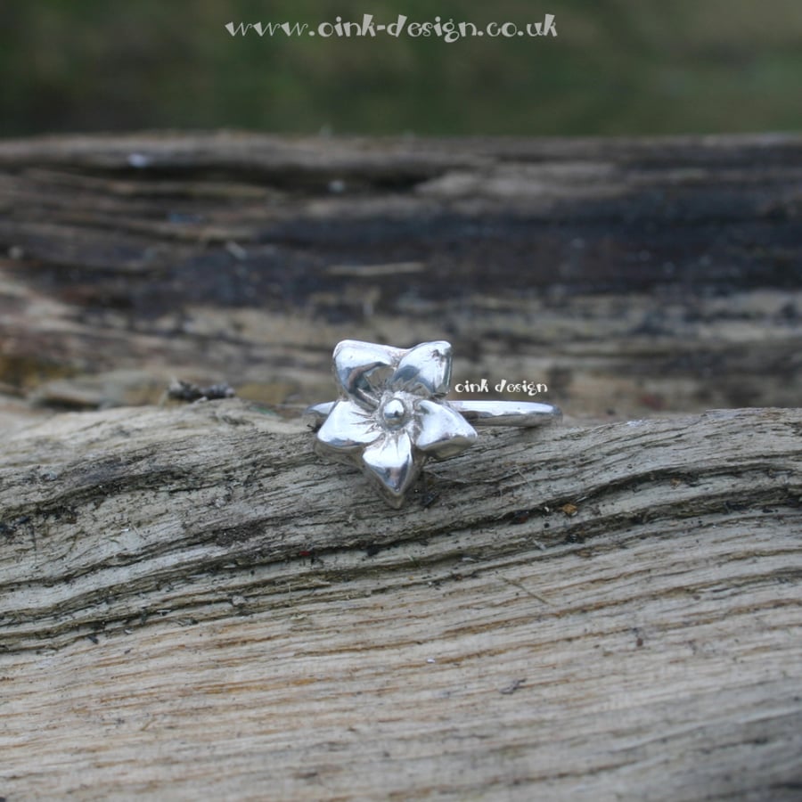 Sterling silver  ring size M with a fine silver flower