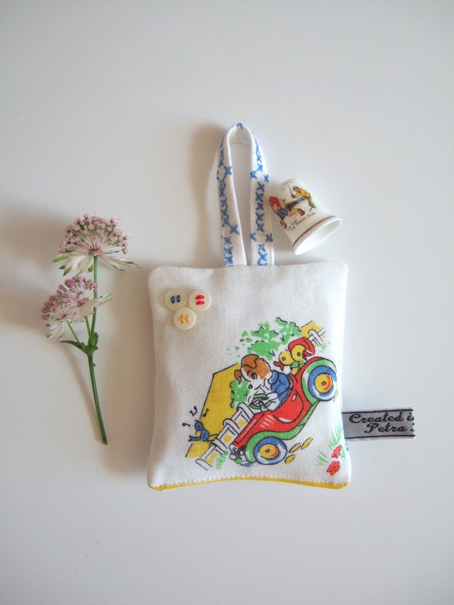   Lavender bag made from a vintage childs hanky with a dog in a classic car.