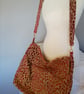 large capacity bohemian style satchel type bag for general but not too heavy use