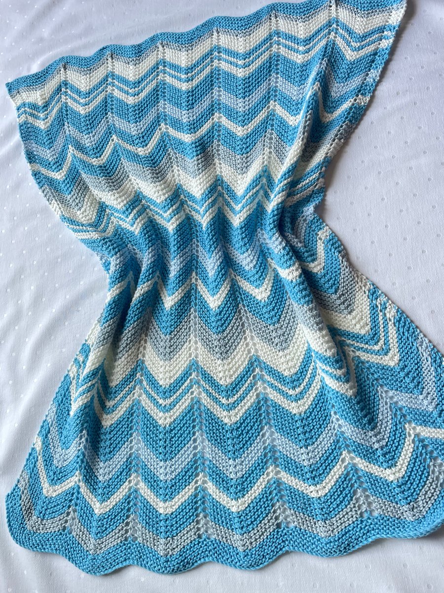Off white and aqua baby blanket, hand knitted in 100% cotton yarn.