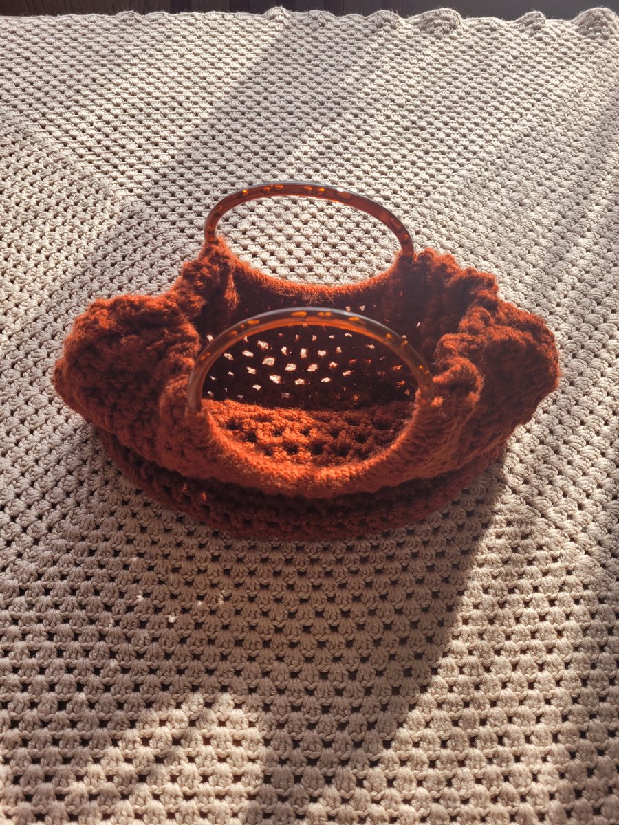 Hand crocheted bag in rust. 