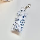 Key ring lip balm holder in blue and white fabric keyring 