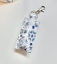 Key ring lip balm holder in blue and white fabric keyring 