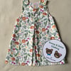 Age 3 years, reversible pinafore dress.