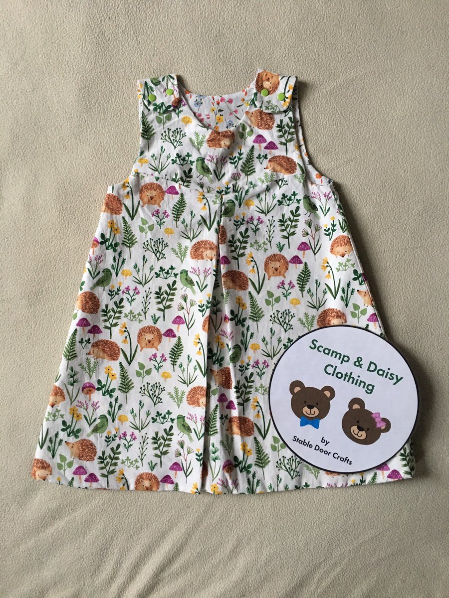 Age 3 years, reversible pinafore dress.