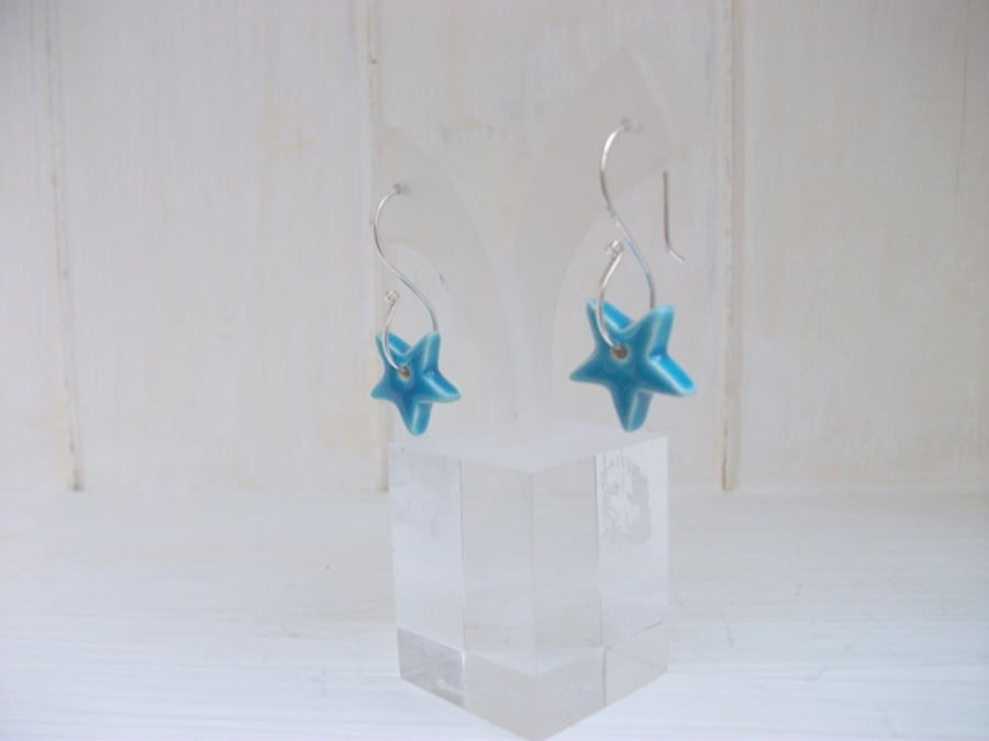 Dangle turquoise ceramic star earrings on sterling silver S wires