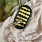 Black trinket tray with Golden stripes