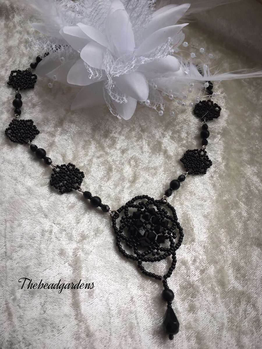 Black beaded flower necklace 