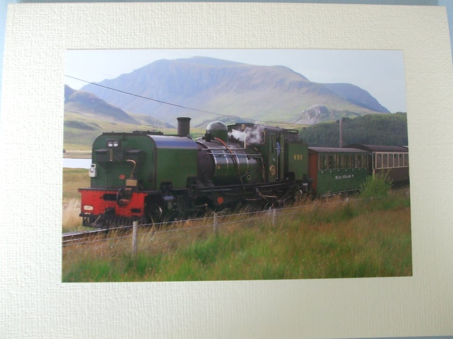 Photographic greetings card of a green steam train.