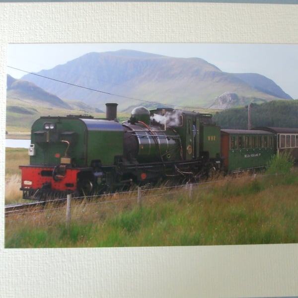 Photographic greetings card of a green steam train.