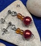 Beautiful orange dangling earrings. - Image 2