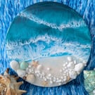 Small round beach with white sand