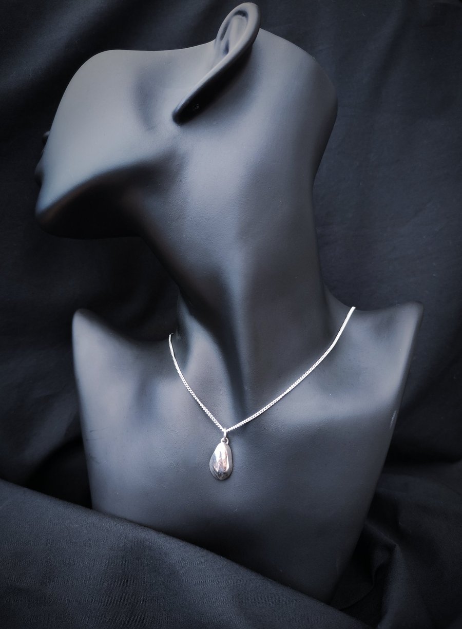 Abstract and organic silver pendant