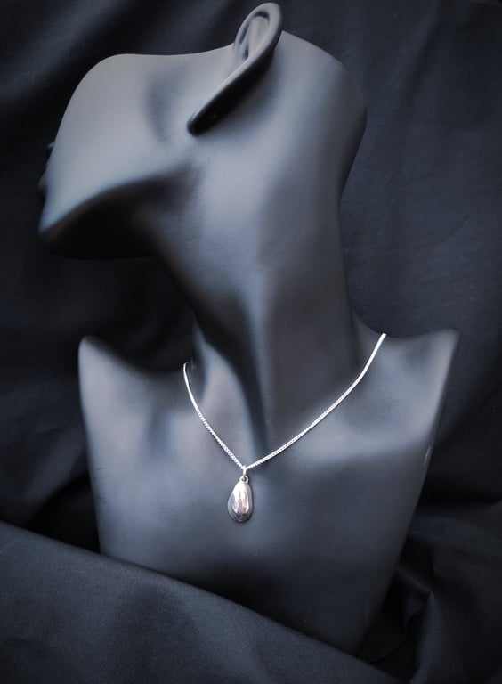 Abstract and organic silver pendant