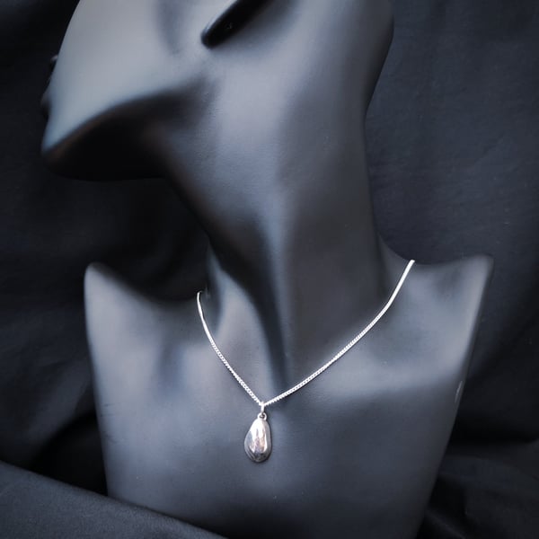 Abstract and organic silver pendant