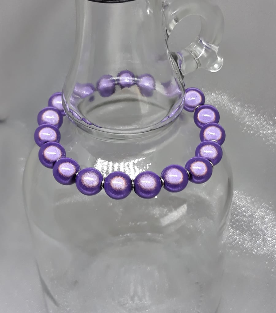 BR266 Shimmering purple miracle bead bracelet