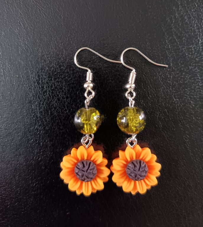 Sunfllower charm silver dangle earrings with green beads