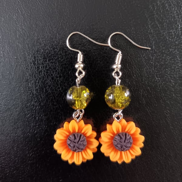 Sunfllower charm silver dangle earrings with green beads