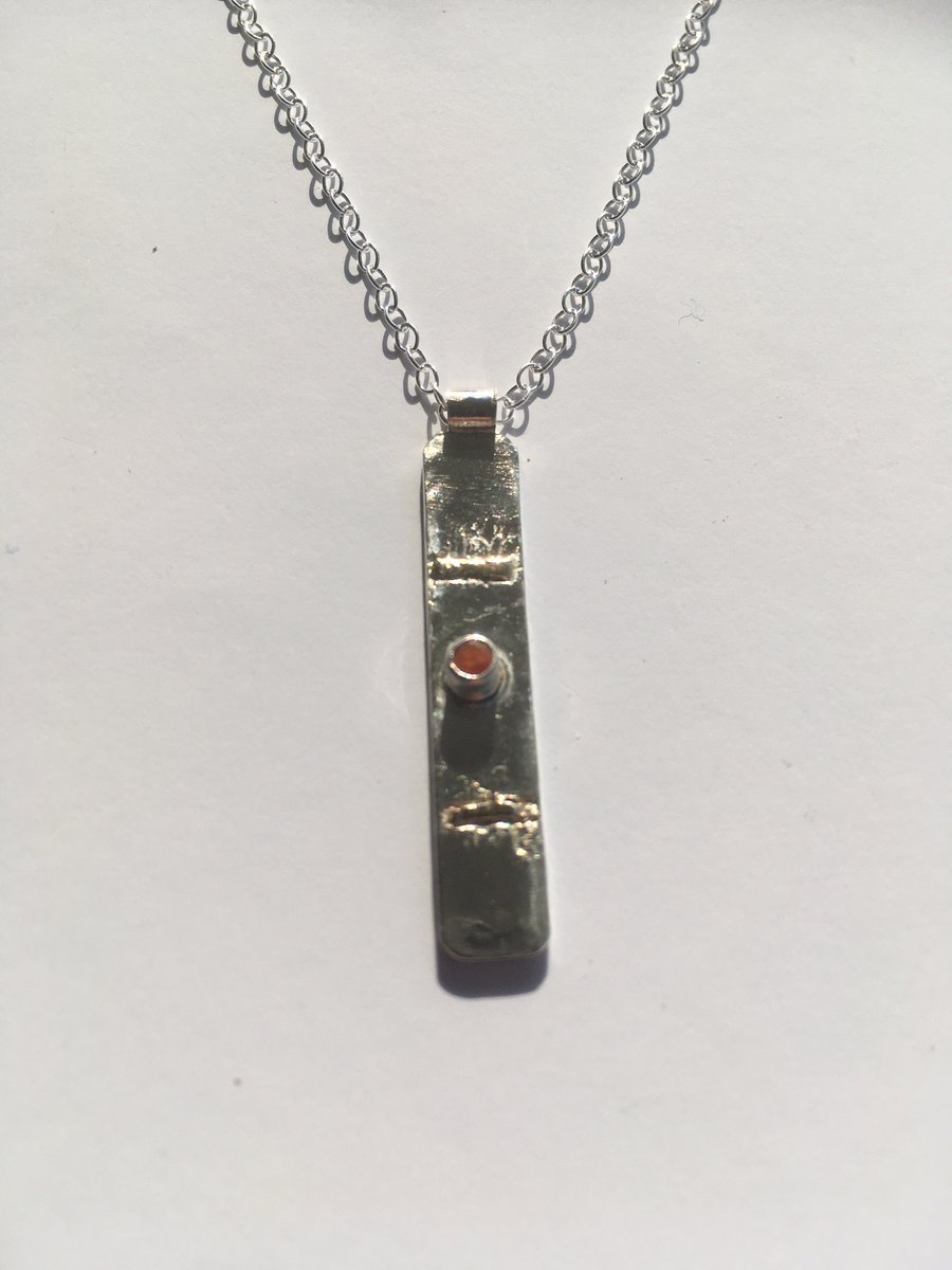 Fire opal grounding pendant 