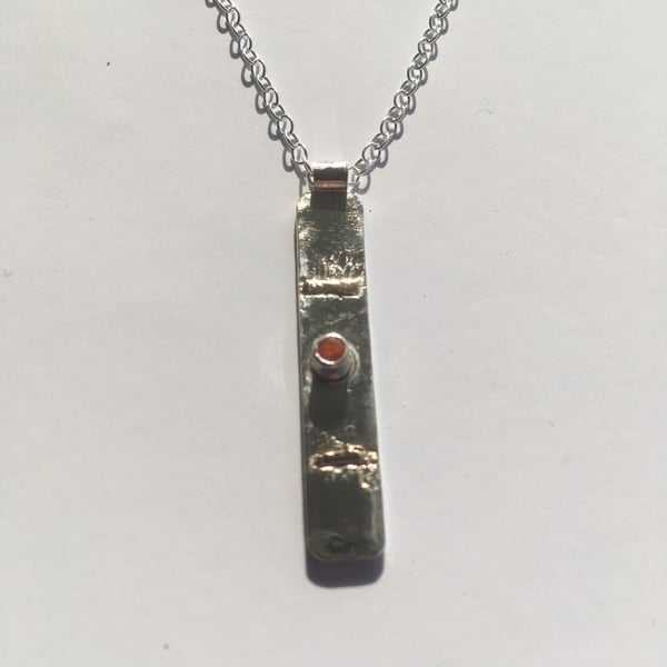 Fire opal grounding pendant 