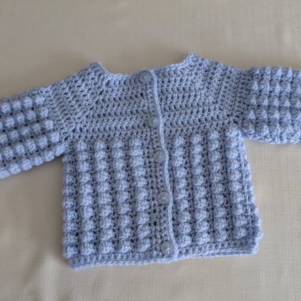 Newborn cardigans or jacket in baby blue for a newborn baby 