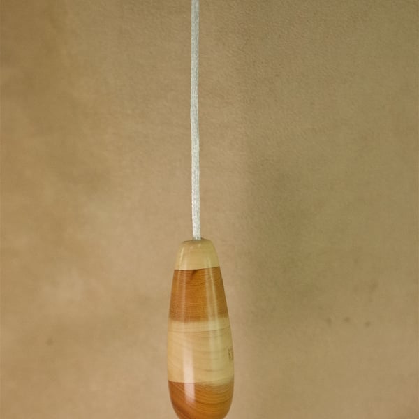 Unique hand made wood light pull pendant. LP05