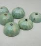 6 Small Verdigris Green Half-round Ceramic Flower Beads - Image 1