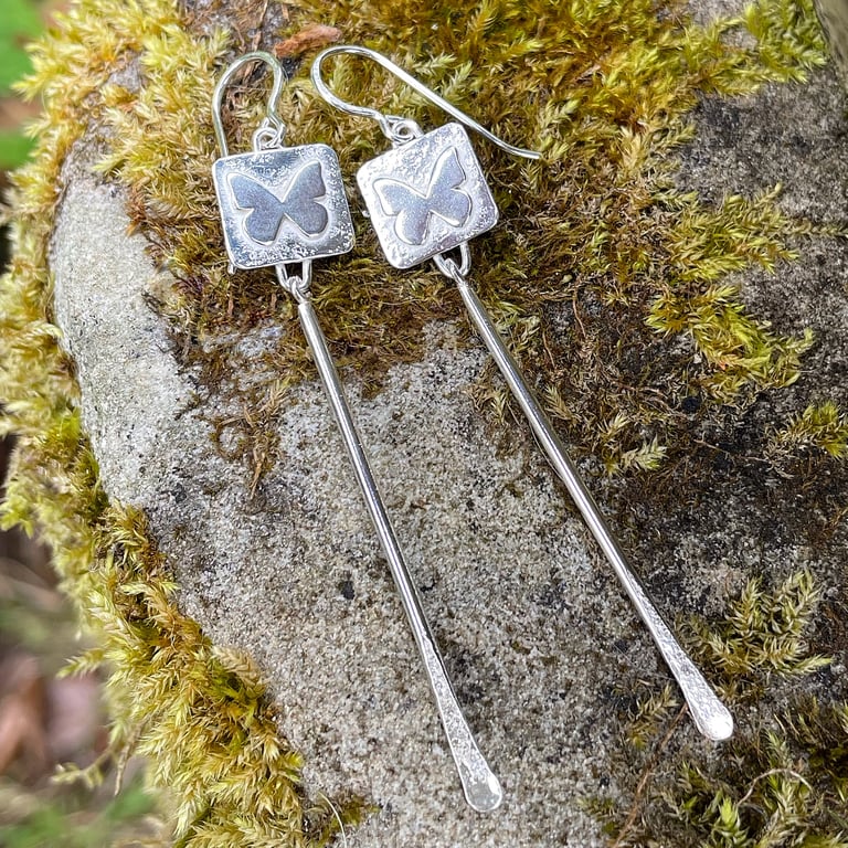Silver long dangly pendulum earrings with butterflies 