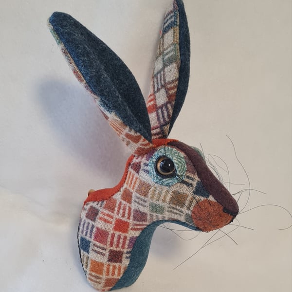 Faux hare head wall mount in harlequin Abraham Moon fabric