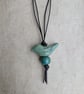 Green ceramic bird pendant on dark brown leather cord - Image 7