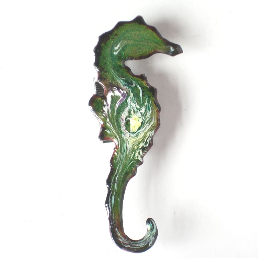 seahorse brooch - scrolled gold and white over green on clear enamel