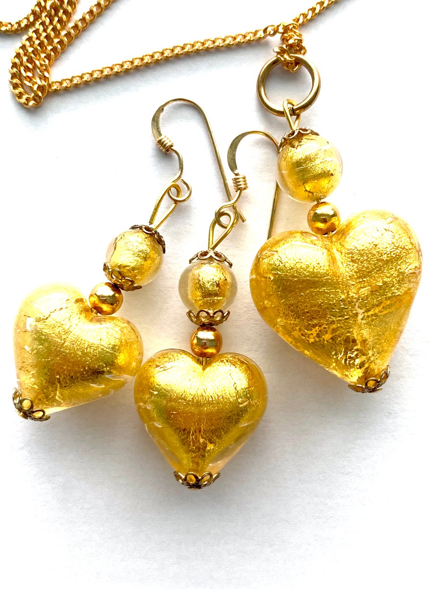 Murano glass gold pendant and earrings set with Swarovski and gold charm