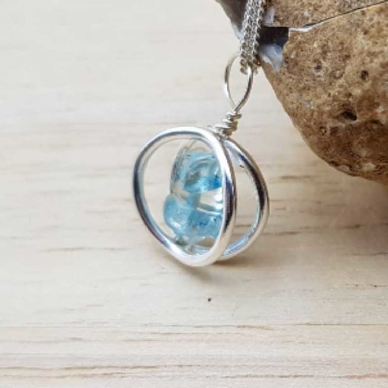 Blue Topaz necklace. November birthstone pendant. Sterling silver circle