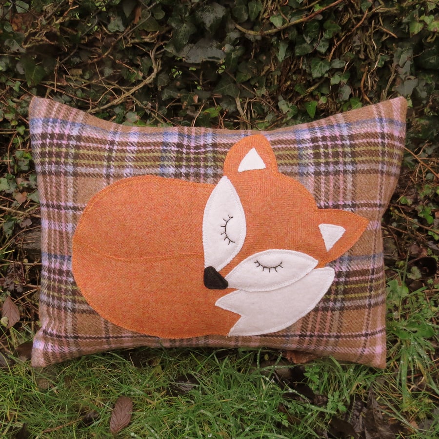 Snoozy fox.  A fox cushion made from tactile wool.  Complete with feather pad.