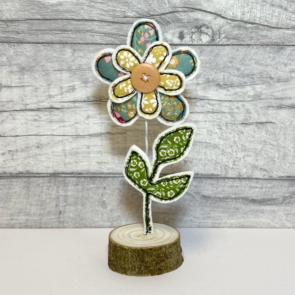 Flower and Leaf on a Wire Stem in a Wooden Stand