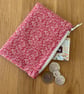Small zipped fabric coin purse, pouch, in pink and cream floral pattern