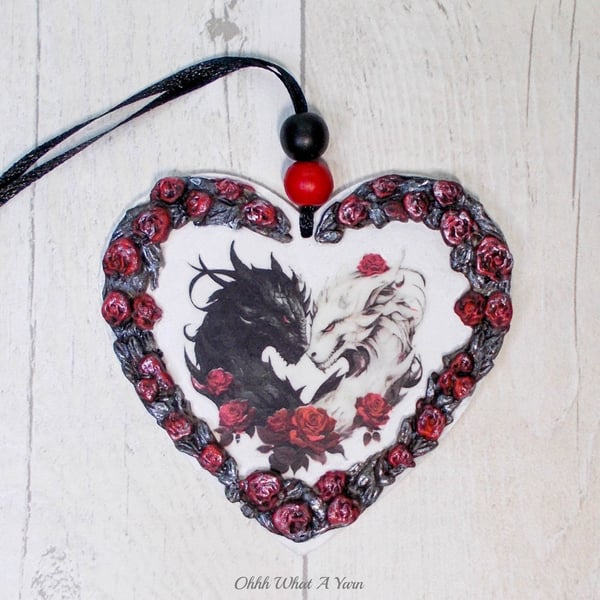 Dragon hanging hearts. Mixed media dragon hanging hearts. Dragon heart.