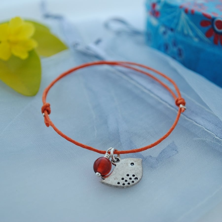 Friendship Bracelet-Orange cord with silver bird 