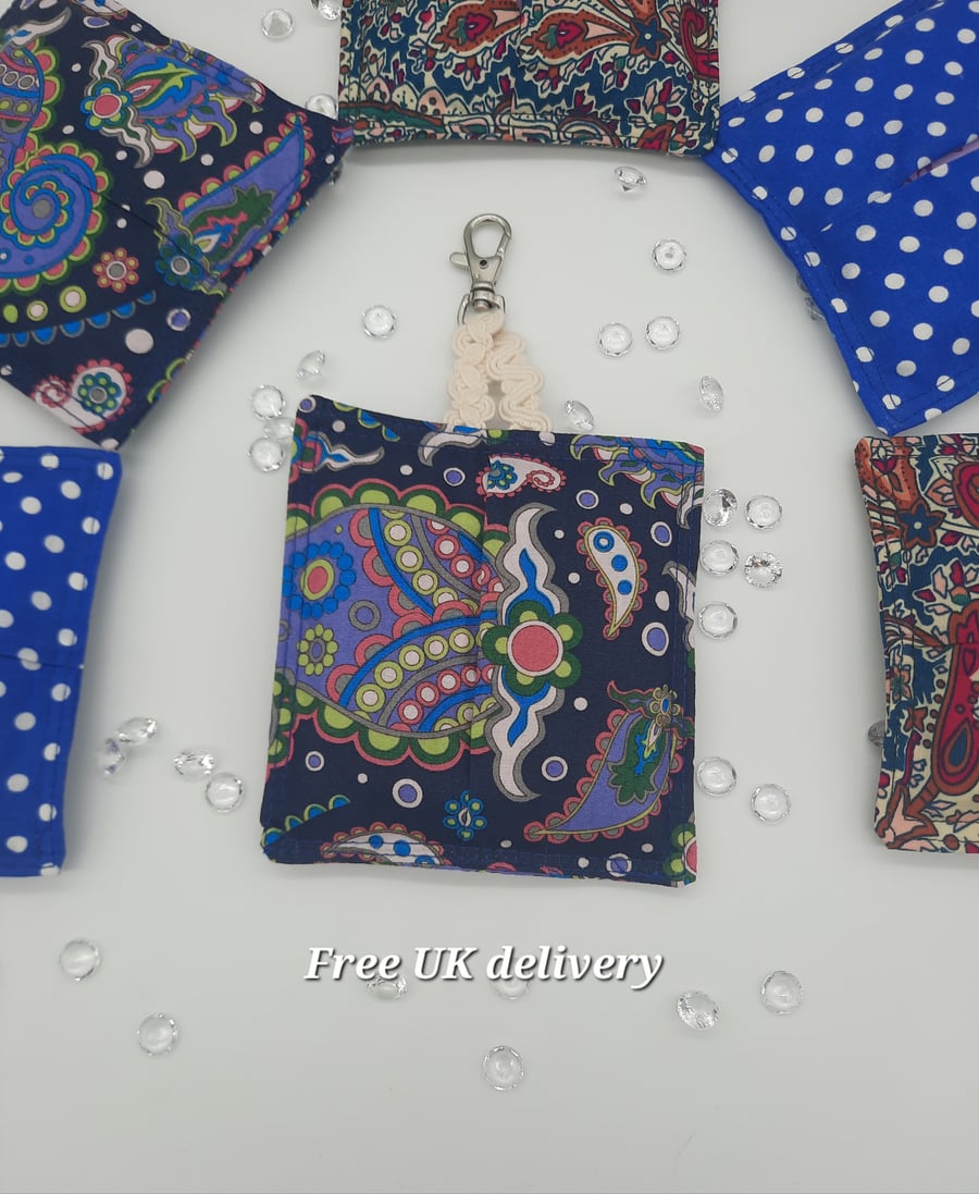 Bag charm sanitary pad holder in blue paisley cotton. 