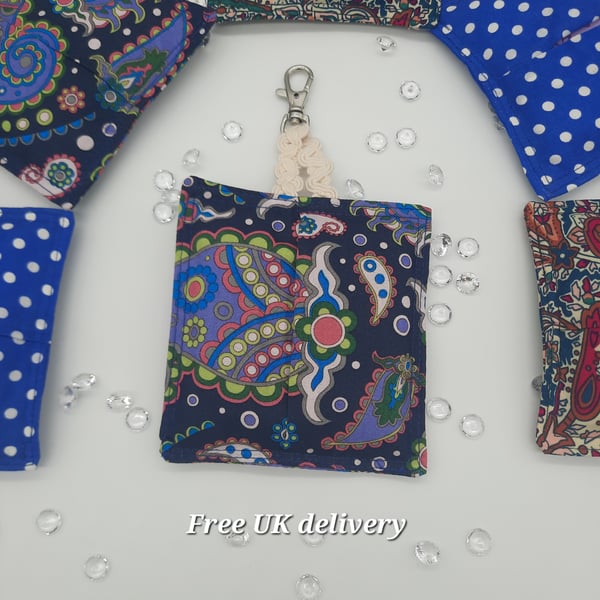 Bag charm sanitary pad holder in blue paisley cotton. 