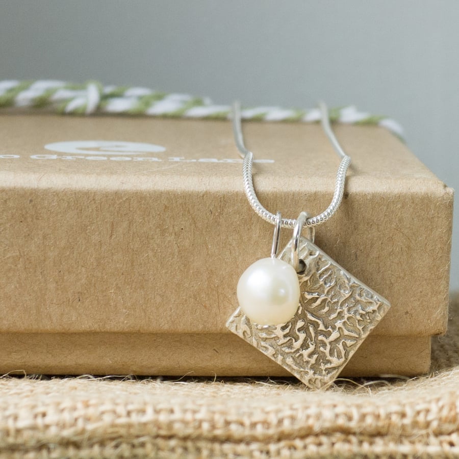 Silver Necklace with a Small Square Charm and Freshwater Pearl