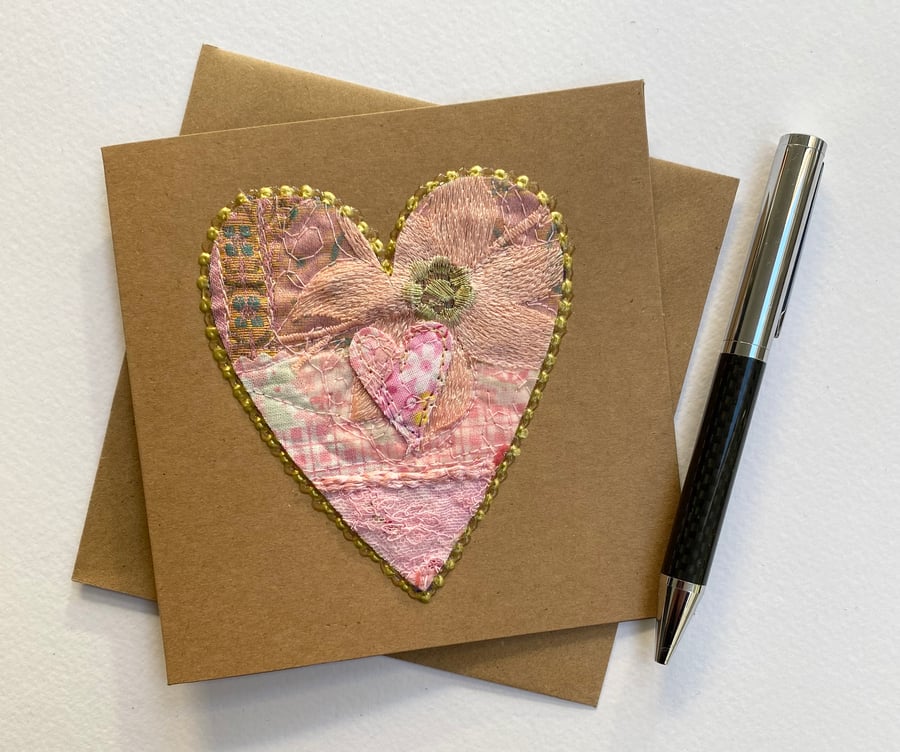 Up-cycled embroidered pink heart card. 