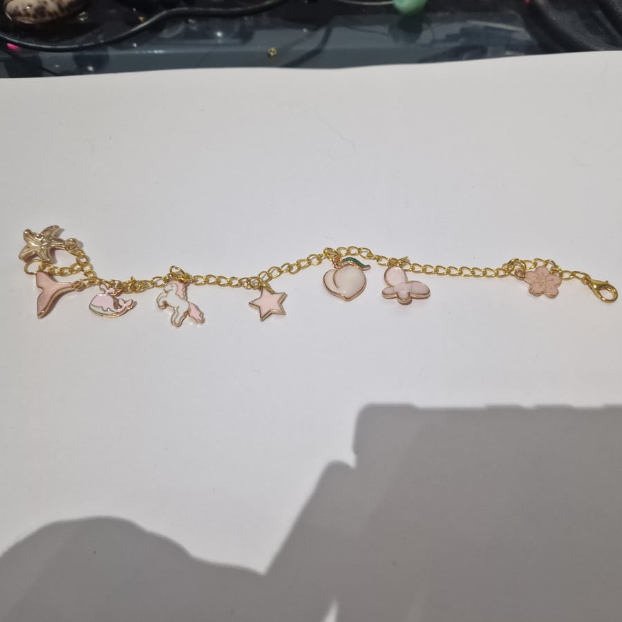 Horse mixed charm gold bracelet