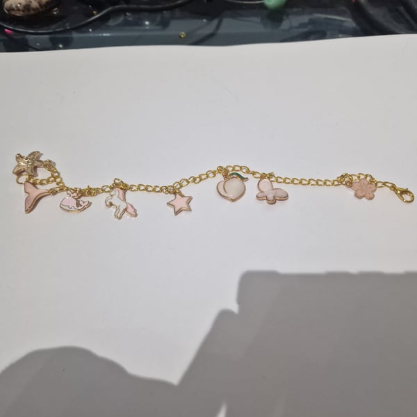 Horse mixed charm gold bracelet