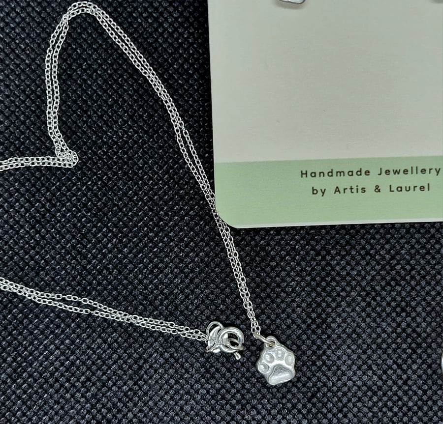 Solid pawprint pendant