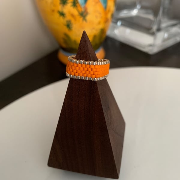 Vibrant bright orange beaded ring