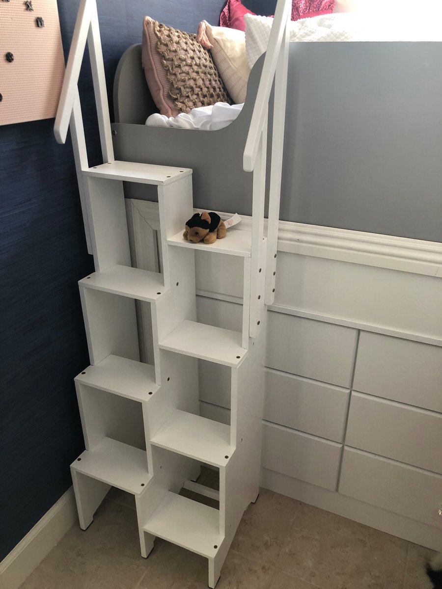 Bunk bed staggered step Up Easy tm branded step ladder with two bannisters. 