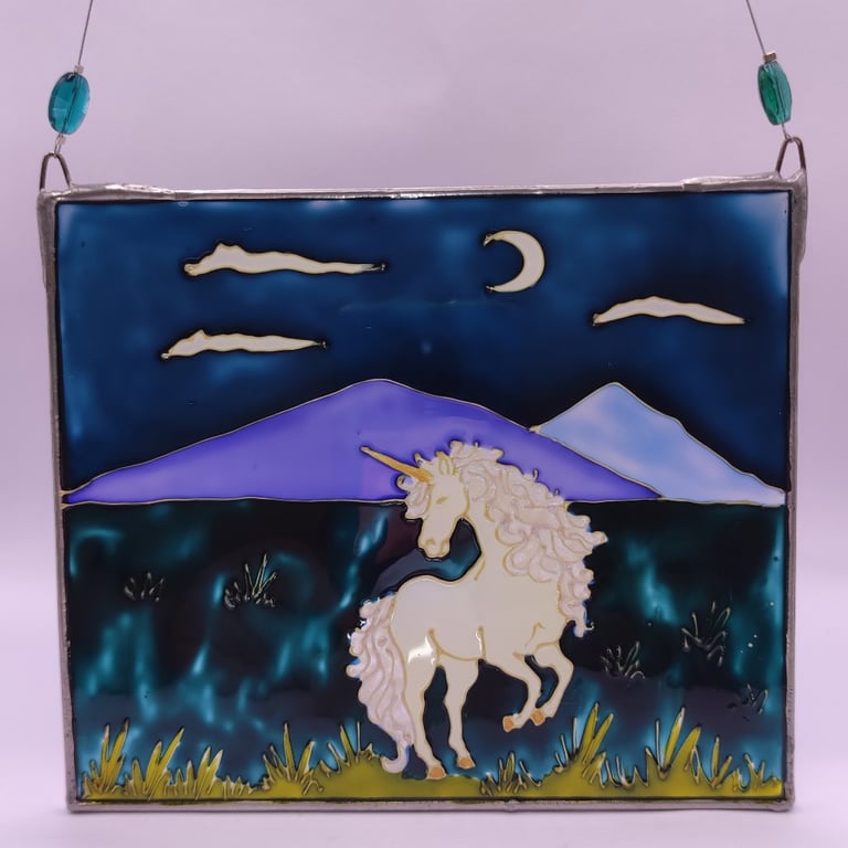 Handmade glass painted window hanging, unicorn, mountains, night sky