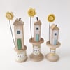 Wooden House on a Vintage Floral Bobbin with Clay Flower 