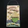 Ceramic pea green boat plaque 